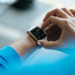 디지털 헬스케어의 진화, 스마트폰 하나로 건강 챙기기! person clicking Apple Watch smartwatch